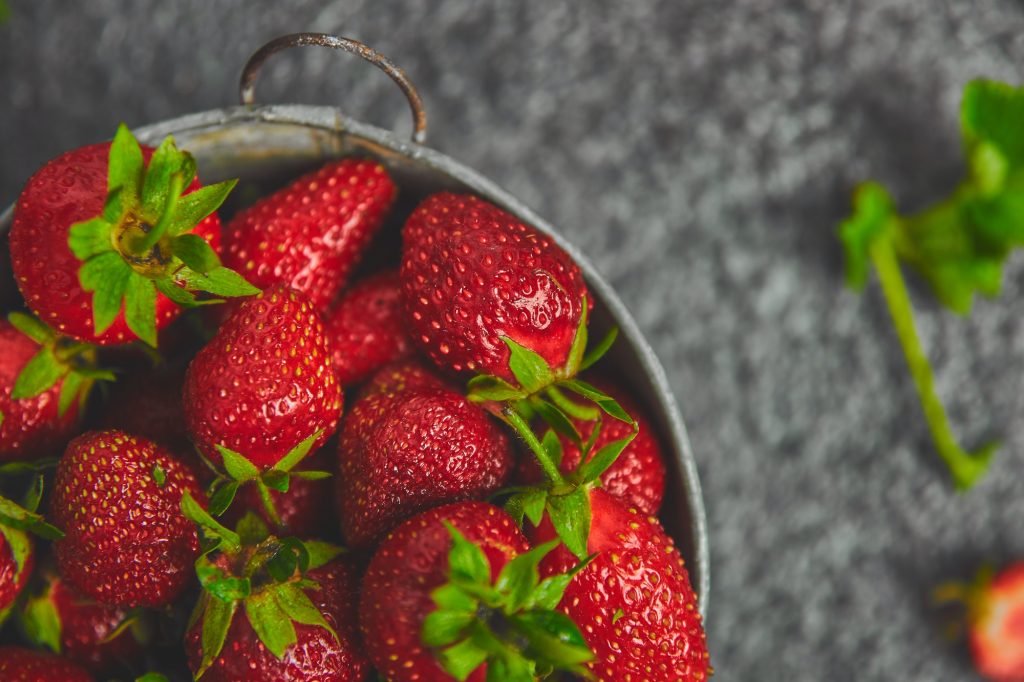 Strawberries in grey bowl. Fresh strawberries. Beautiful strawberries.