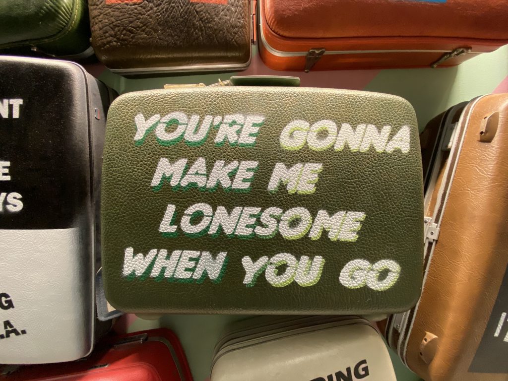Words in the wild - long distance relationships- suitcase - love and happiness- lonely