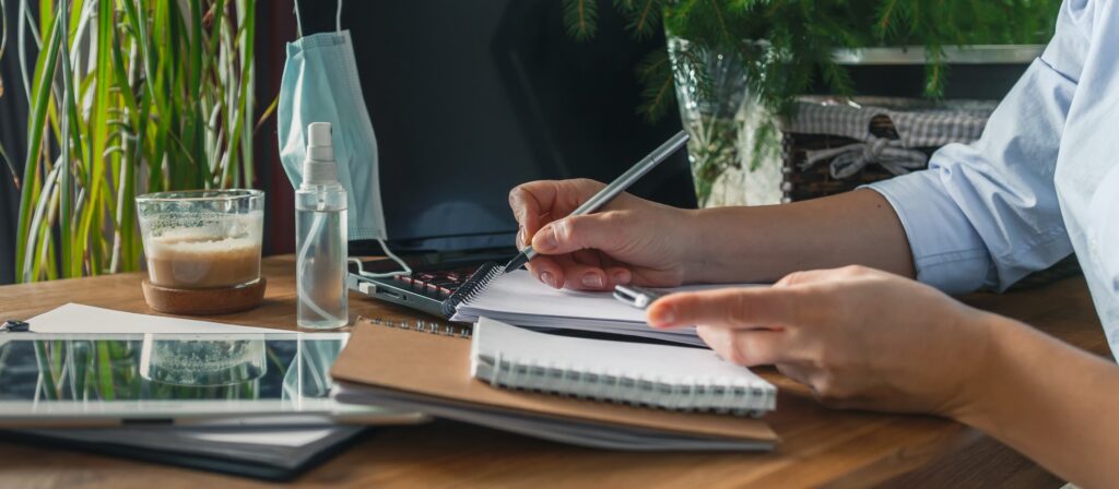 Home budget financial planning in crisis. Woman quarantined and working, planning home budget
routine